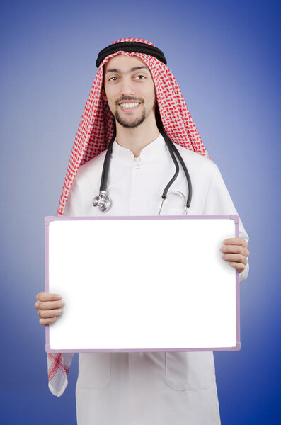 Arab doctor with blank message board