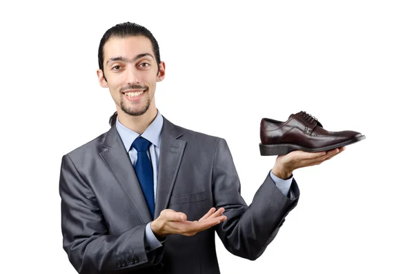 Man with a selection of shoes — Stock Photo, Image