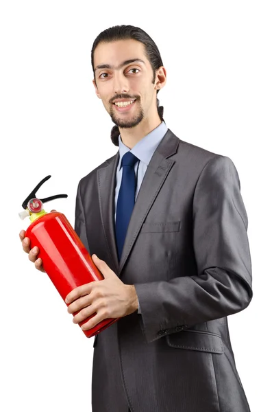 Man with fire extinguisher in firefighting concept — Stock Photo, Image