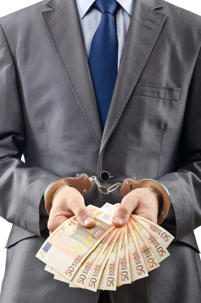 Hombre esposado con billetes en euros —  Fotos de Stock