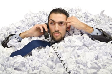 Man with lots of waste paper clipart