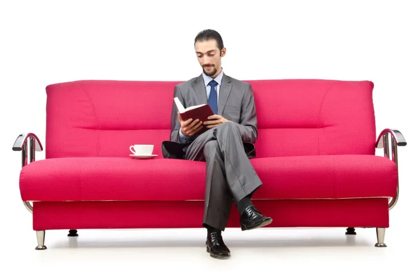 Mannen som sitter i soffan — Stockfoto