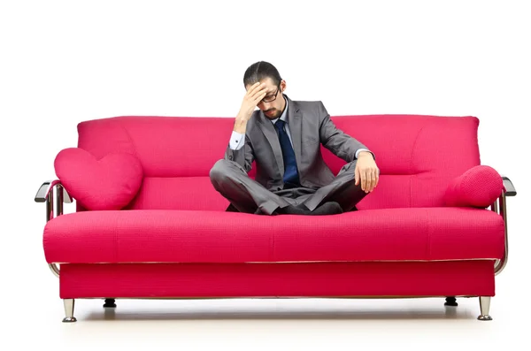 Homem sentado no sofá — Fotografia de Stock