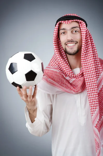 Arab with football in studio shooting — Stock Photo, Image