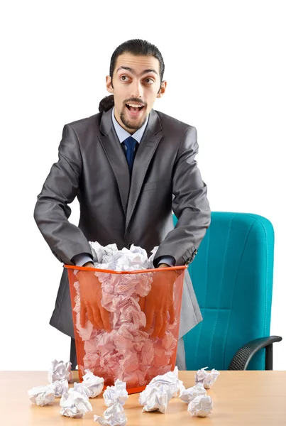 Hombre con mucho papel desperdiciado — Foto de Stock