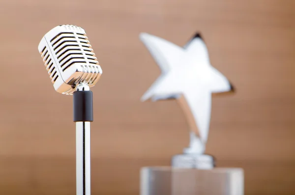 Star award against wooden background — Stock Photo, Image