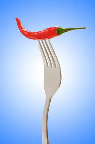 Red pepper on the fork — Stock Photo, Image