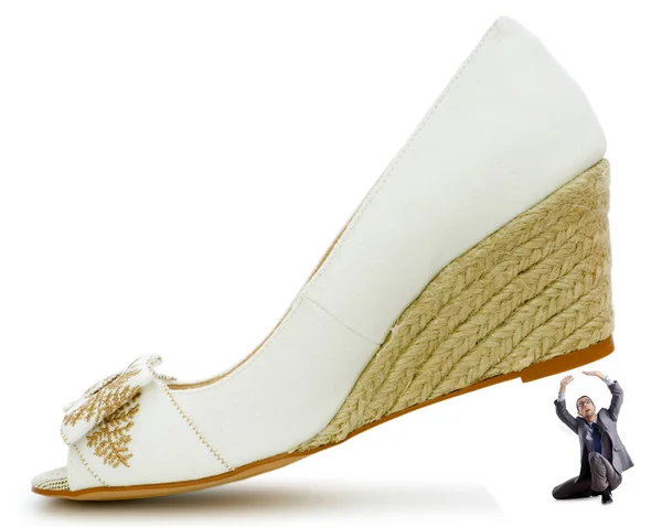 Concepto de dominación femenina con zapatos y hombre —  Fotos de Stock