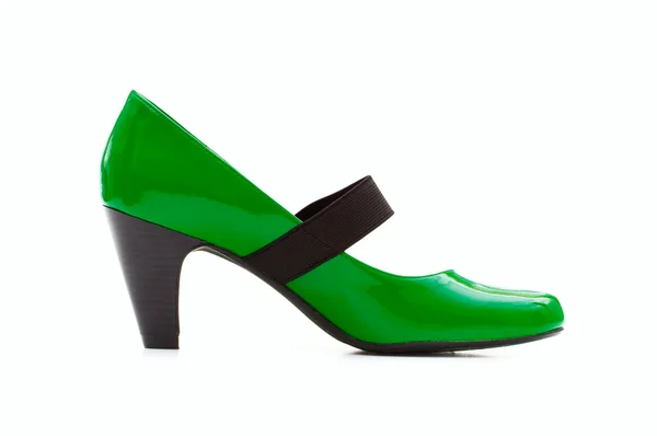 Gröna kvinnliga skor på vit bakgrund — Stockfoto