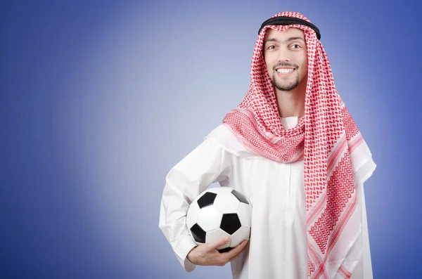Arabiska med fotboll i studio fotografering — Stockfoto