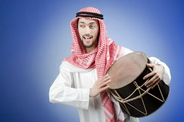 Arab playing drum in studio shooting — Stock Photo, Image