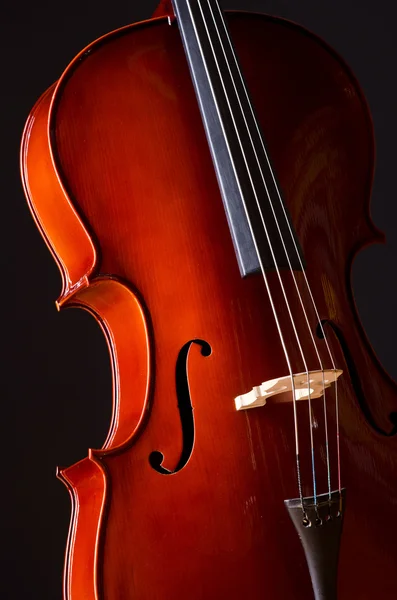 Musik cello i det mörka rummet — Stockfoto