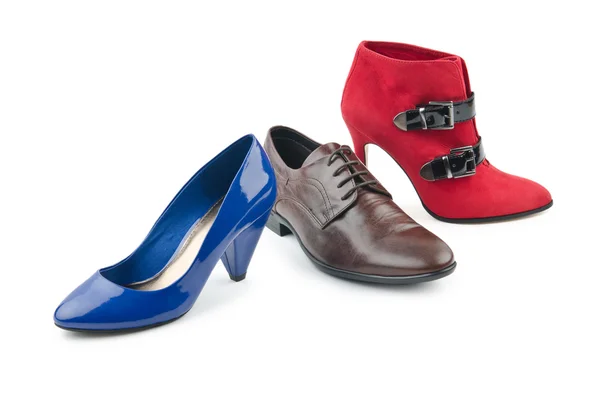 Mužské a ženské boty na bílém pozadí — Stock fotografie