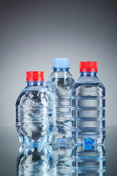 Water bottles as healthy drink concept — Stock Photo, Image