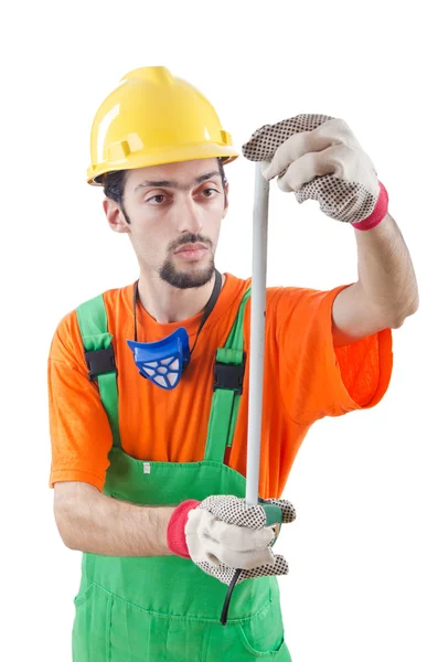 Dělník s měřící páska na bílém pozadí — Stock fotografie