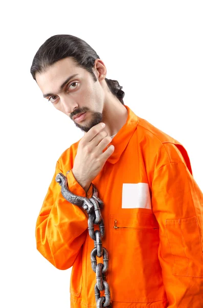 Criminal in oranje gewaad in de gevangenis — Stockfoto