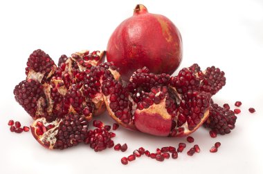 Ripe fresh pomegranates clipart