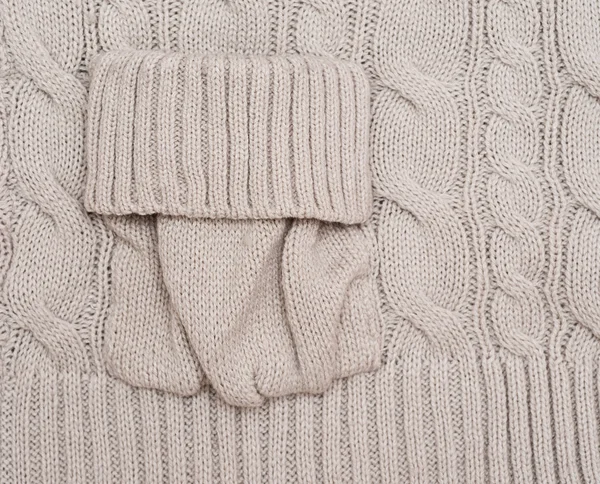 Fond en laine tricoté avec une poche — Photo