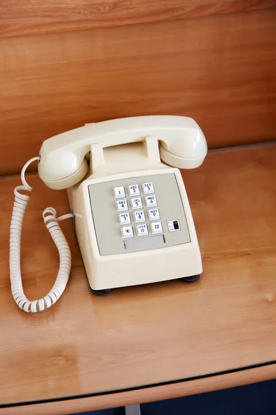 Telefone na mesa de cabeceira — Fotografia de Stock