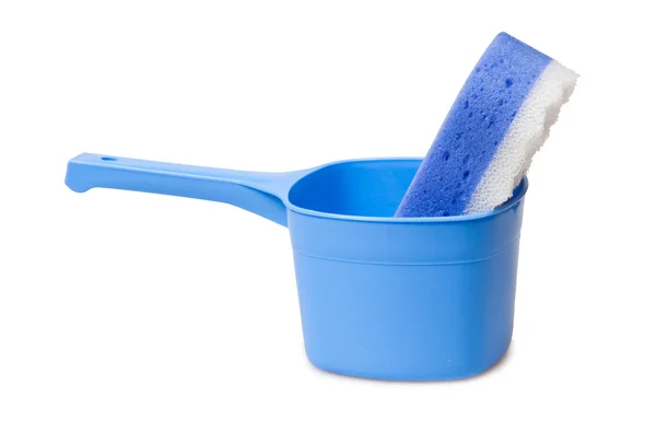 Plastic scoop with bath whisp Royalty Free Stock Photos