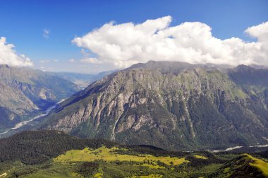 Summer view of high mountain Dombaj. Russia