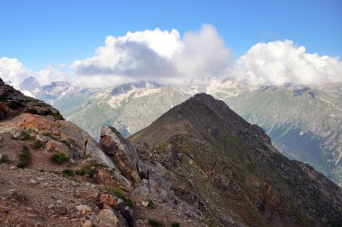 Summer view of high mountain Dombaj. Russia