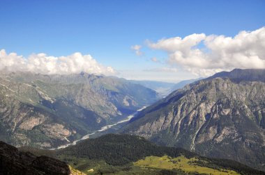 Summer view of high mountain Dombaj. Russia