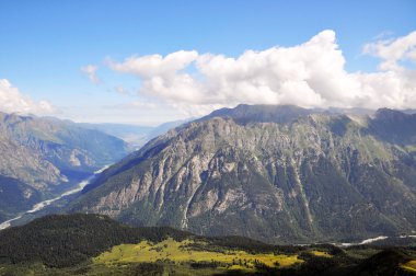 Summer view of high mountain Dombaj. Russia