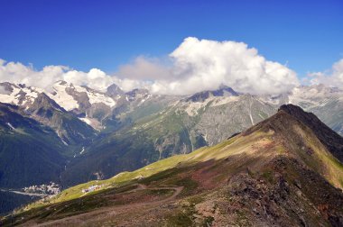 Summer view of high mountain Dombaj. Russia