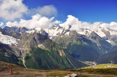 Summer view of high mountain Dombaj. Russia