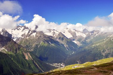 Summer view of high mountain Dombaj. Russia