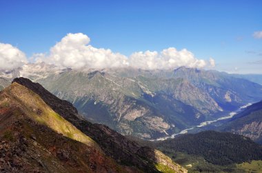 Summer view of high mountain Dombaj. Russia