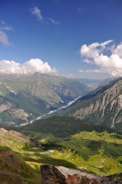 Summer view of high mountain Dombaj. Russia