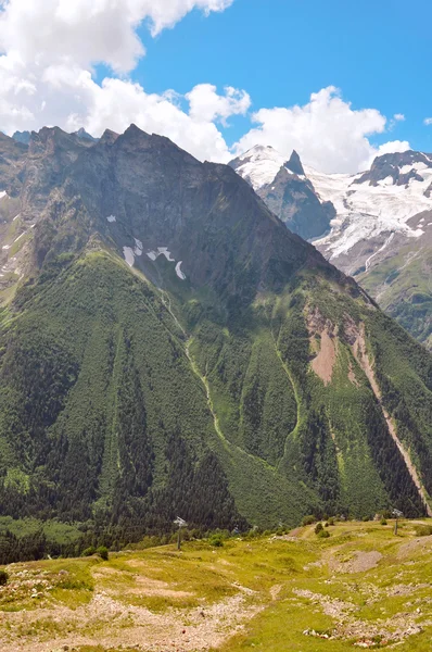 stock image Nice panoramic view of high mountain Dombaj. Russia