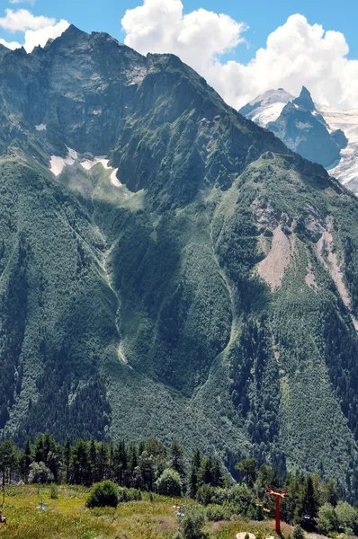 stock image Nice panoramic view of high mountain Dombaj. Russia