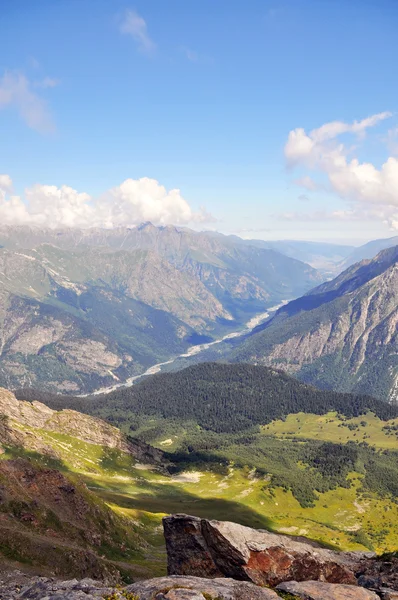 Summer view of high mountain Dombaj. Russia