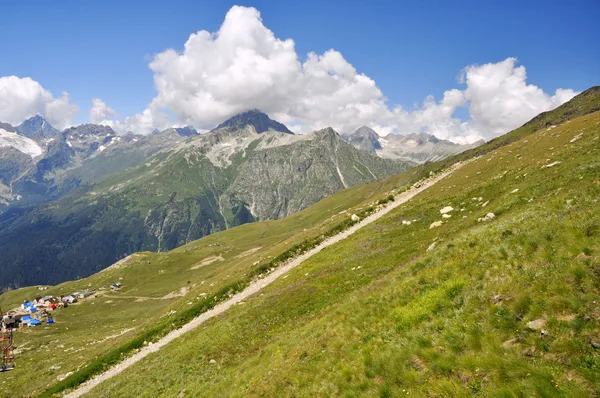 stock image Nice panoramic view of high mountain Dombaj. Russia