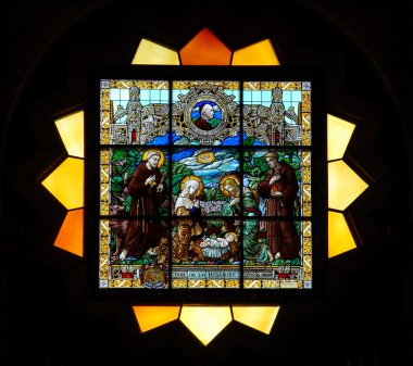 Stained glass window in St.Vitus cathedral clipart