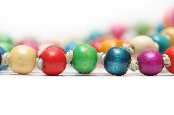 stock image Beautiful colorful beads on white background