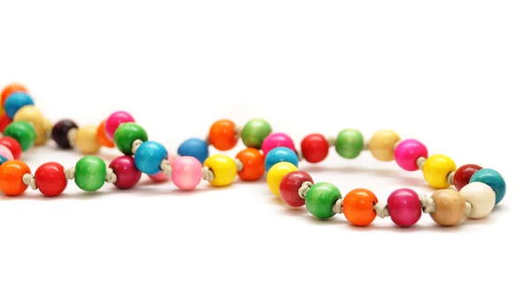 stock image Beautiful colorful beads on white background