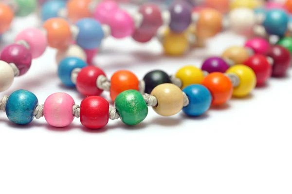 stock image Beautiful colorful beads on white background