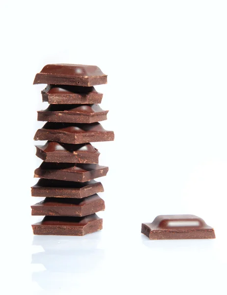 Blocks of chocolate isolated on white background — Stock Photo, Image