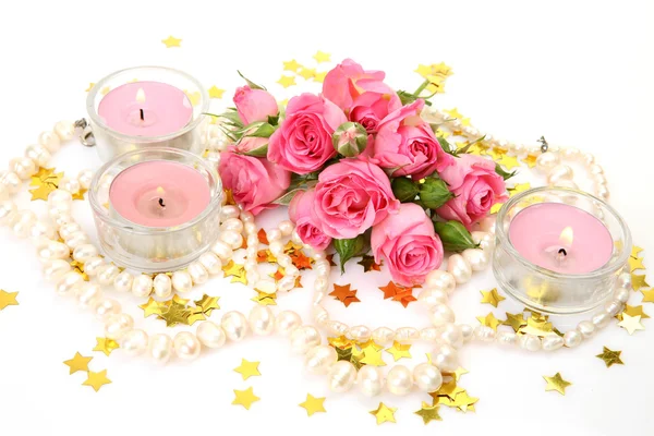 Pink roses and candles — Stock Photo, Image