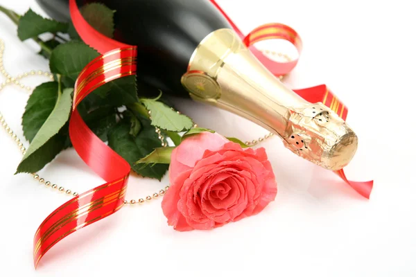 Pink roses and champagne — Stock Photo, Image