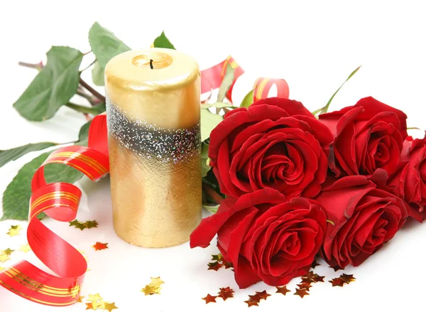 Bouquet of roses and candle — Stock Photo, Image