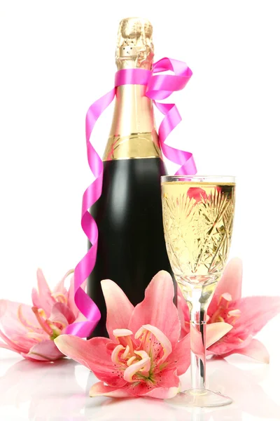 Pembe lilyum ve şampanya — Stok fotoğraf