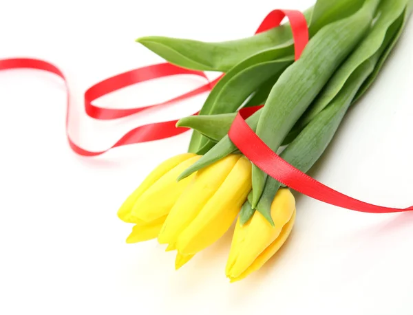 Желтые тюльпаны и лента — стоковое фото
