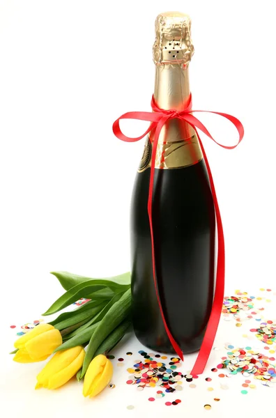 Šampaňské a tulipány — Stock fotografie