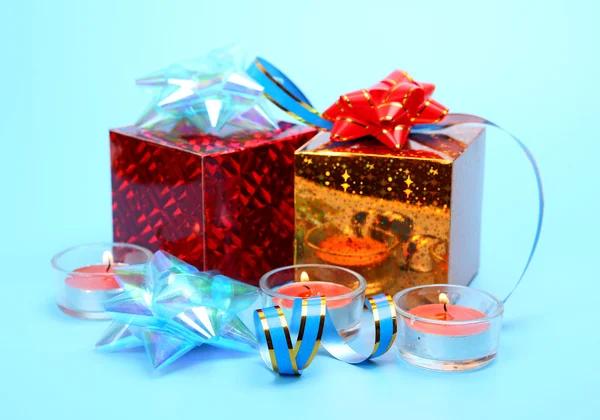 Box with a gift and candles — Stock Photo, Image