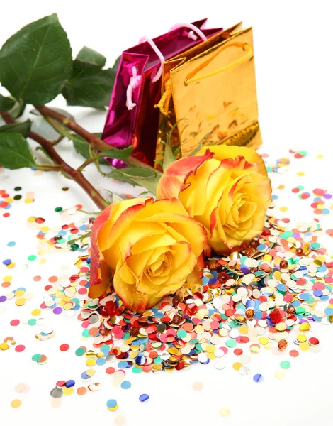 Yellow roses and packages — Stock Photo, Image